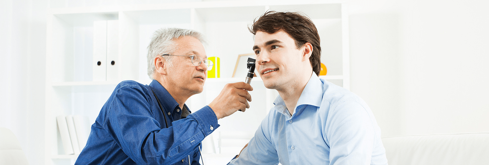all-about-hearing-hearing-loss-man-takes-hearing-test-1600x540